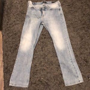 There light grey and white jeans